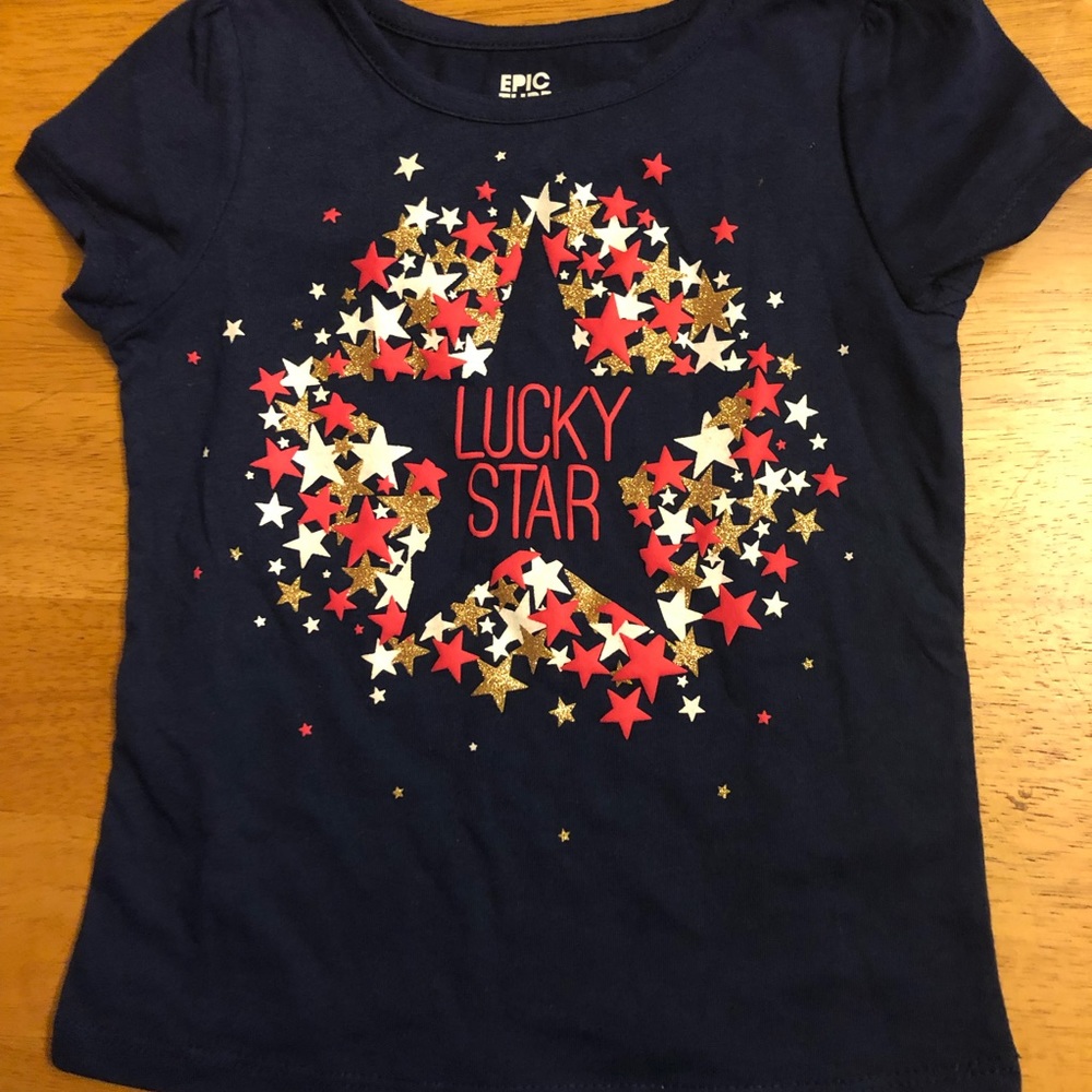 Epic Threads Blue with “Lucky Star” in red/gold